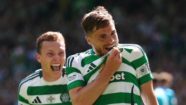 James Forrest celebrates his late equaliser (Andrew Milligan/PA)
